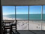 Direct ocean-front triple 4 feet stacked sliders to either side of the condo